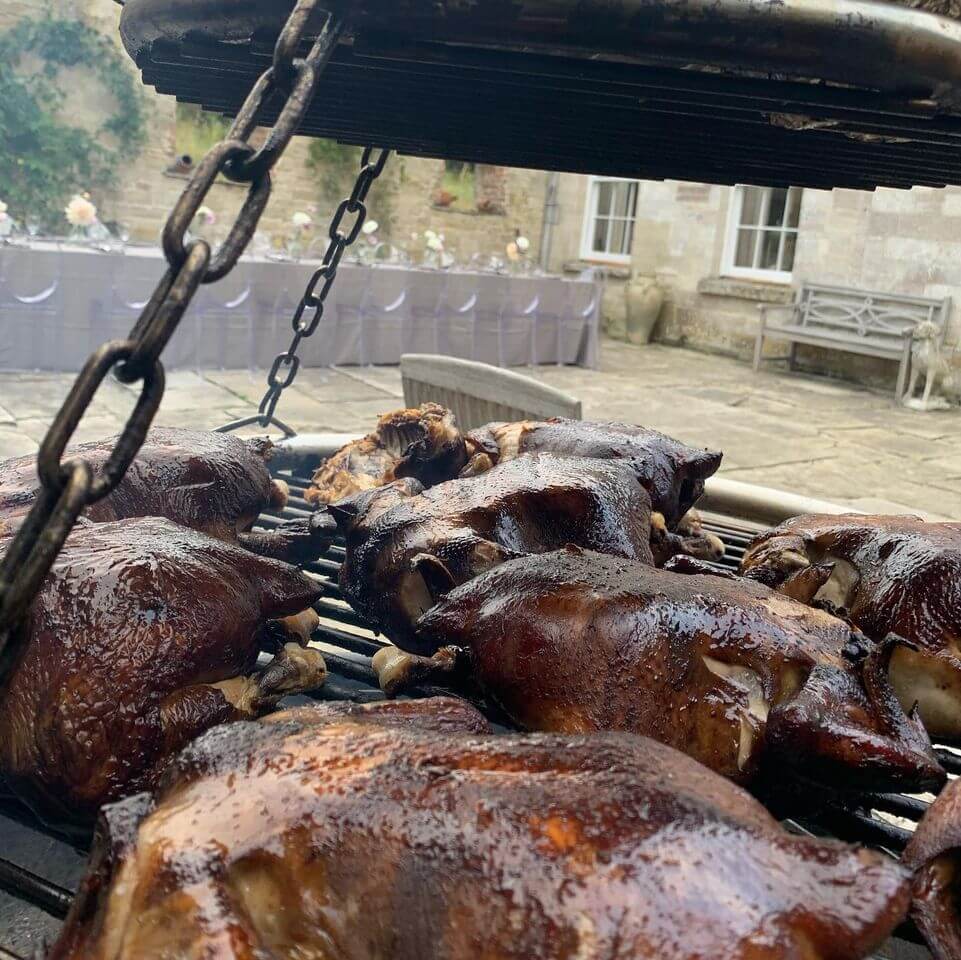 Smoked Chicken, Roasting on the BBQ grill - Dorset Event and Wedding Caterer